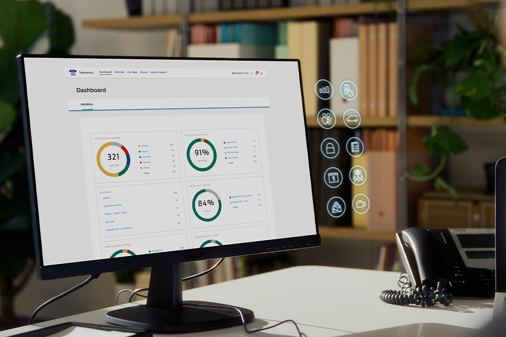 Computerbildschirm zeigt Ford Pro Telematik-Dashboard mit Flottenkennzahlen